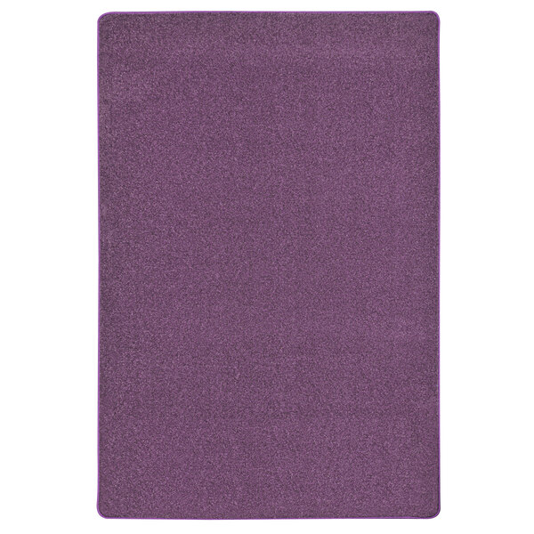 A purple rug with a white border.