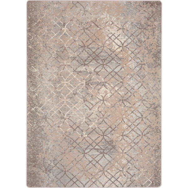A close up of a Joy Carpets Hazelwood area rug with a beige and grey geometric pattern.
