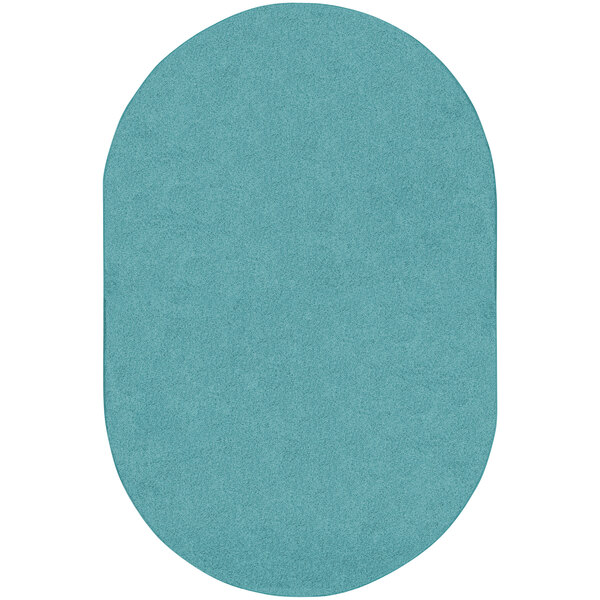 A seafoam blue oval area rug.