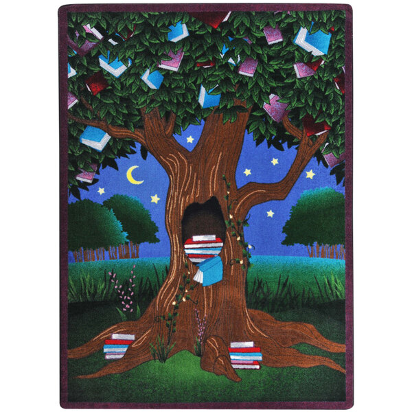 A multicolored rectangular area rug with a tree and books on it.