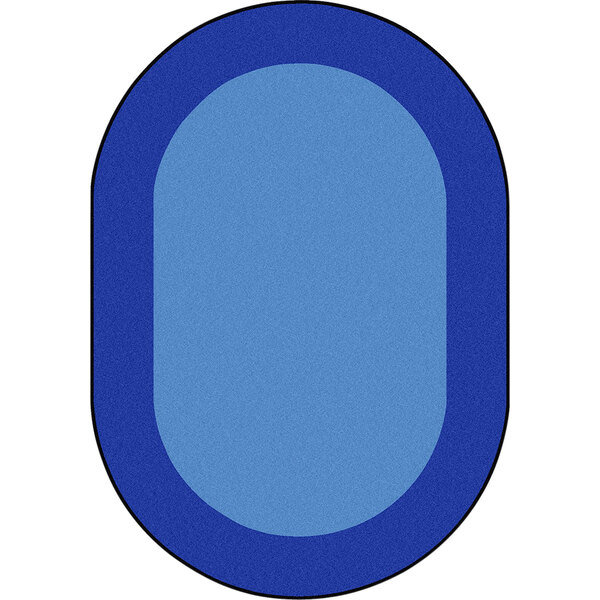 A blue oval rug with a white border.