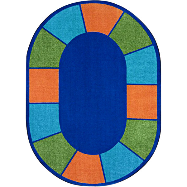 A close-up of a Joy Carpets multicolored oval rug with a blue, orange, and green border.