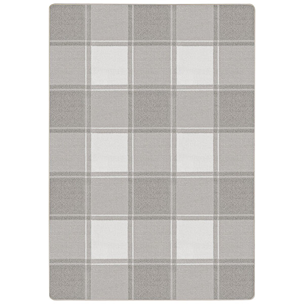 A grey and white plaid Joy Carpets Impressions area rug with a white border.