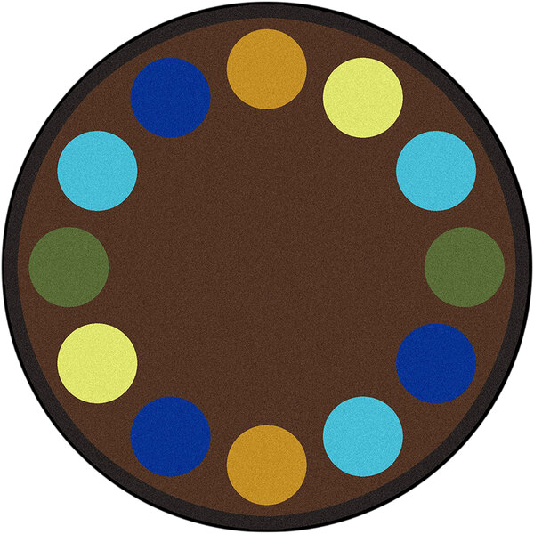 A white circular rug with blue, green, yellow, and brown dots in a circular design.