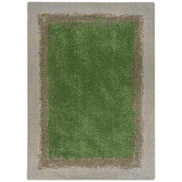A white rectangle area rug with green and brown stripes and a green border.