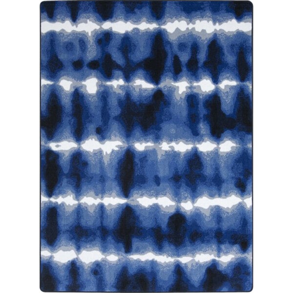A close-up of a cobalt blue and white rug with a pattern.