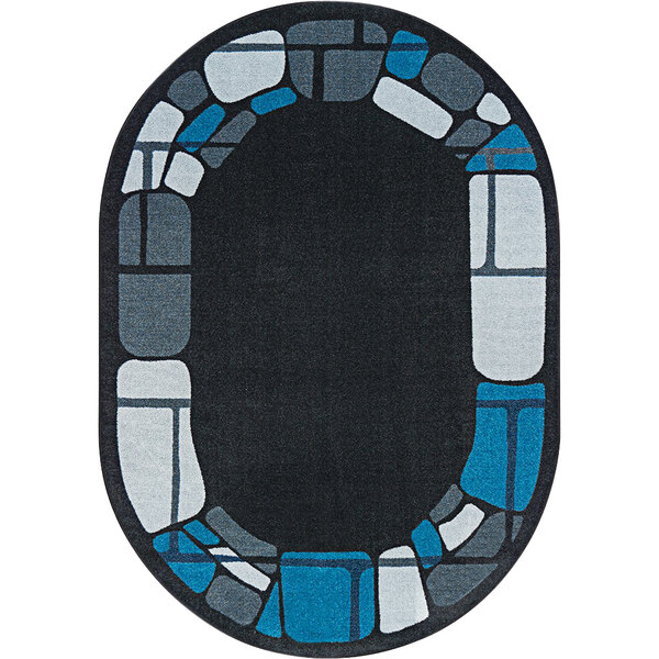 A black and blue oval area rug with a design of squares in the middle.