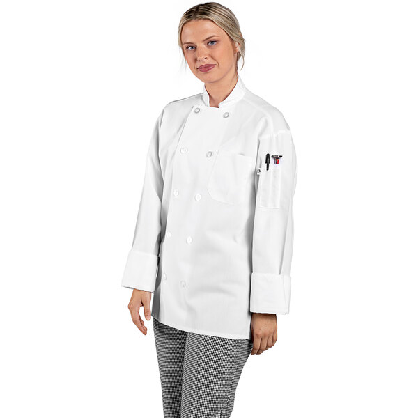 A woman wearing a white Uncommon Chef long sleeve chef coat with a mesh back.