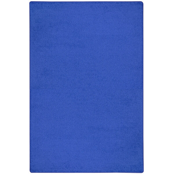 A royal blue rectangle area rug with a white border.