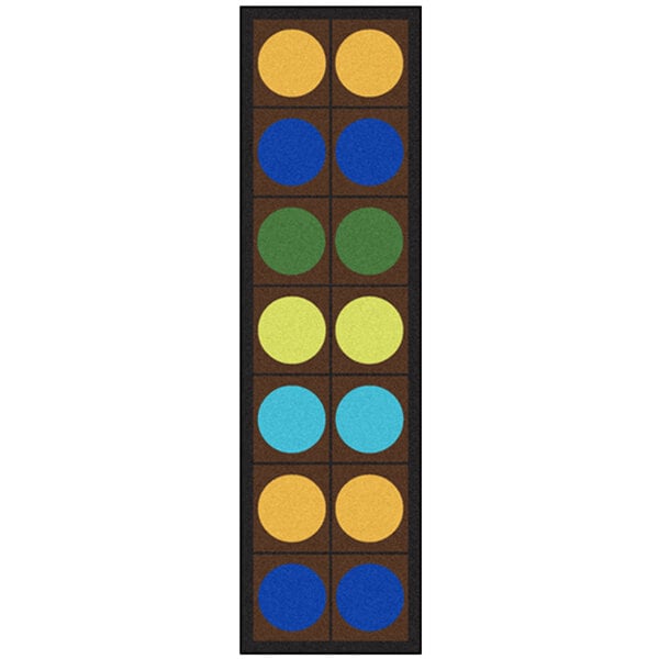 A brown runner with colorful circles in blue, green, and yellow.