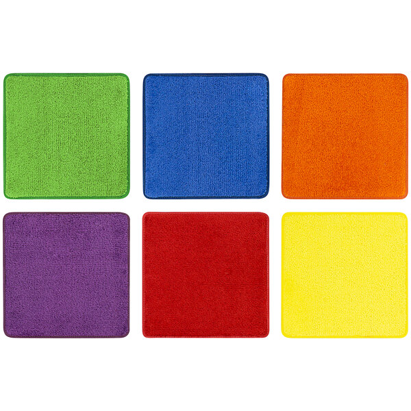 A group of multi-colored square carpets with white borders.
