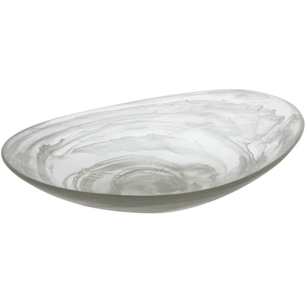 A white oval bowl with a swirl pattern on it.