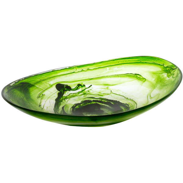 A green Bon Chef oval bowl with black swirls on a table.