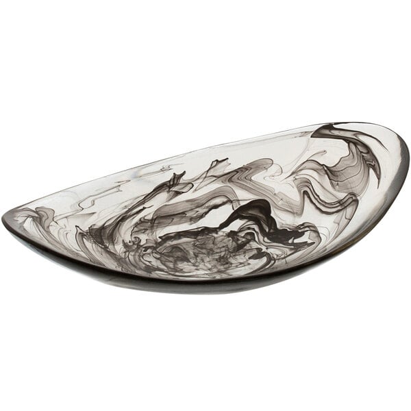A black and white Bon Chef oval shallow bowl with swirls on it.