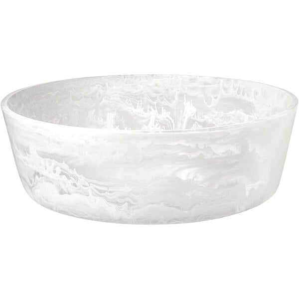 A white Bon Chef round bowl with a marble pattern on it.