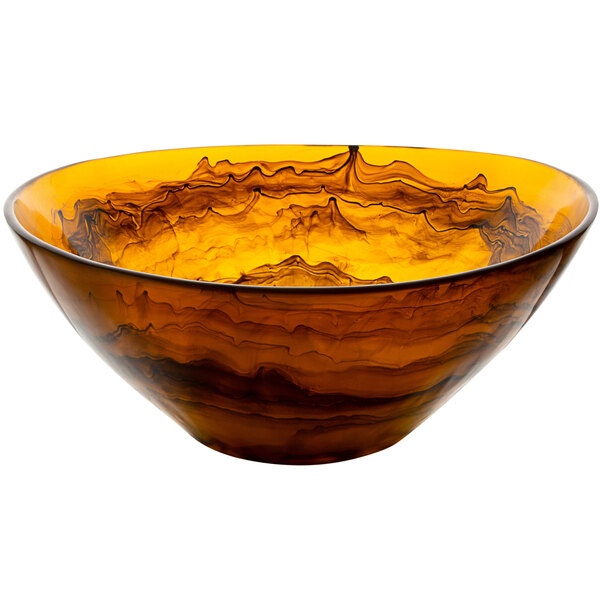 An oval Bon Chef serving bowl with a yellow and brown swirl design.