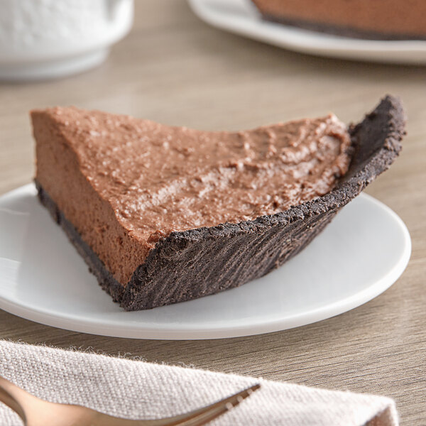 A slice of chocolate pie in a chocolate cookie pie crust.