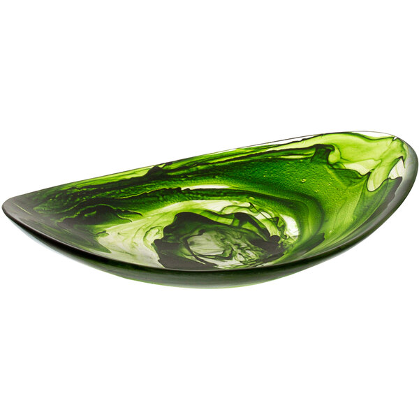 A green Bon Chef oval bowl with swirls on a table.
