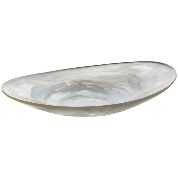 A white Bon Chef oval serving bowl with a blue and white swirl design.