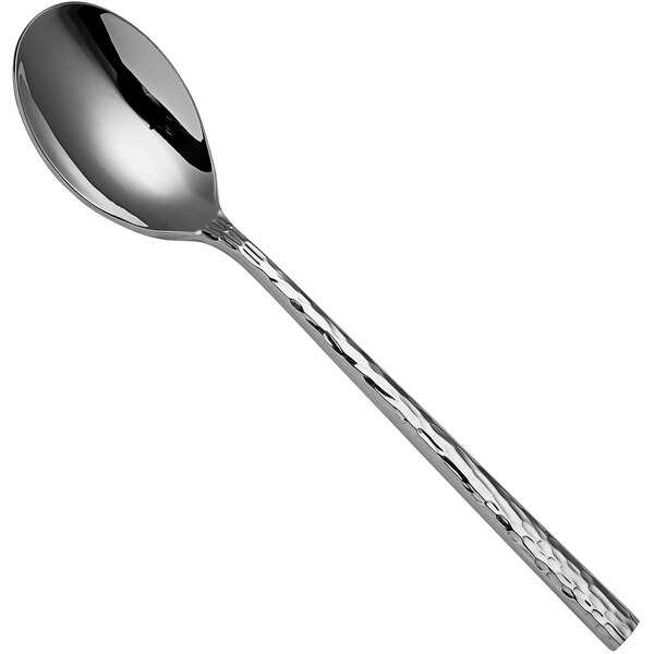 A Sola stainless steel serving spoon with a handle.
