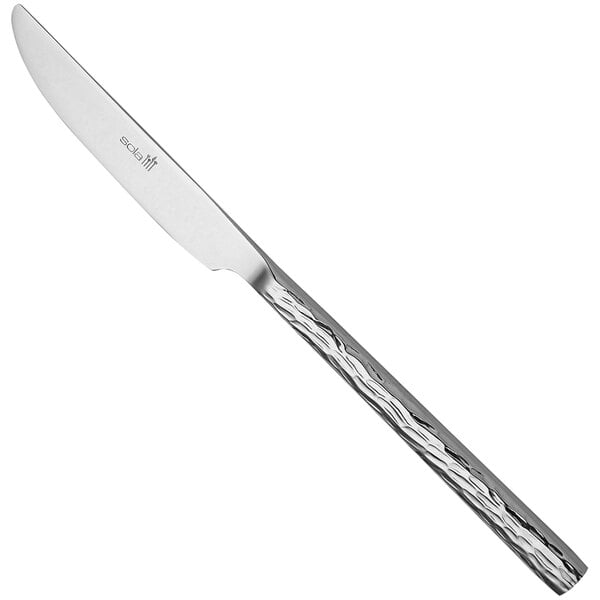 A Sola Lausanne stainless steel table knife with a textured silver handle.