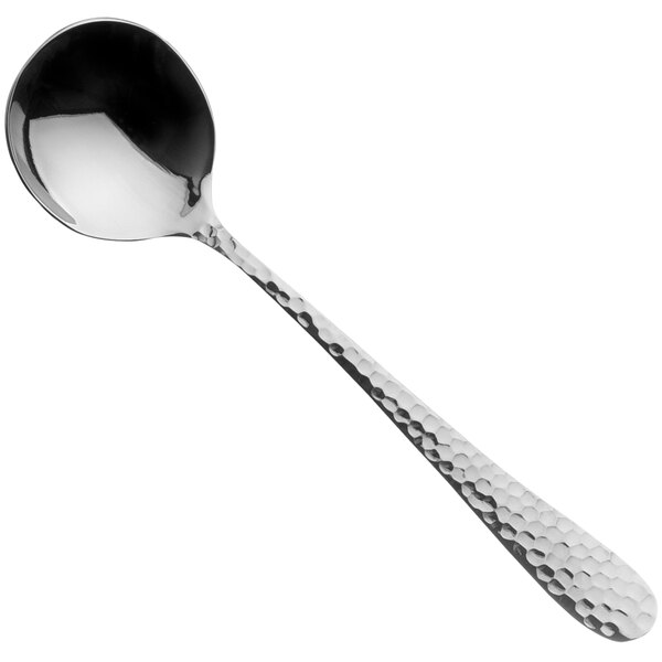 A Sola stainless steel soup spoon with a black handle.