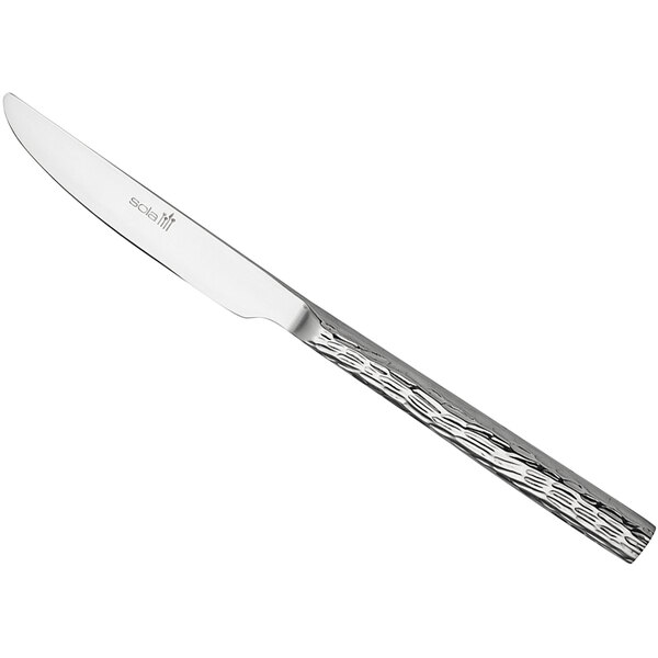 A Sola stainless steel knife with a textured silver handle.