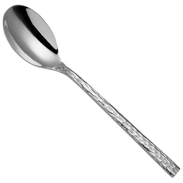 A Sola stainless steel teaspoon with a handle.