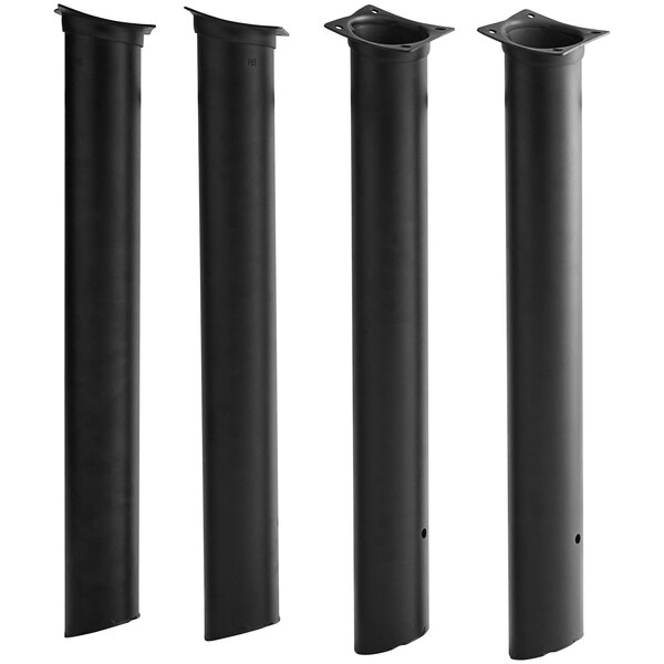 A group of black metal pipe stands.