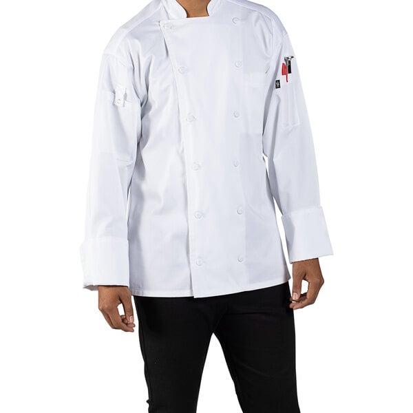 A man wearing a Uncommon Chef long sleeve white chef coat with mesh back.