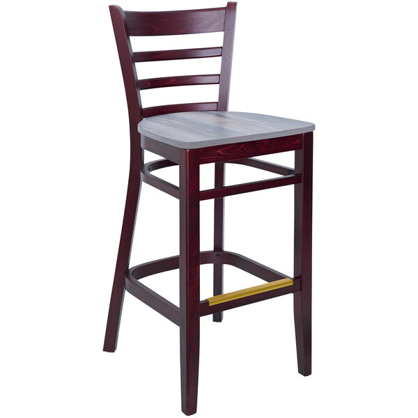 A BFM Seating wooden ladder back barstool with a wooden seat.