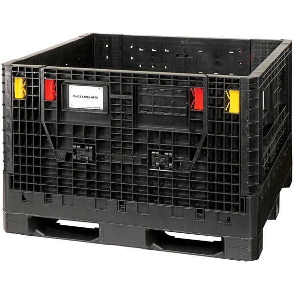 A black plastic crate with red and yellow labels.