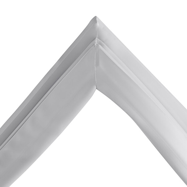 A white plastic gasket corner for an Avantco unit.