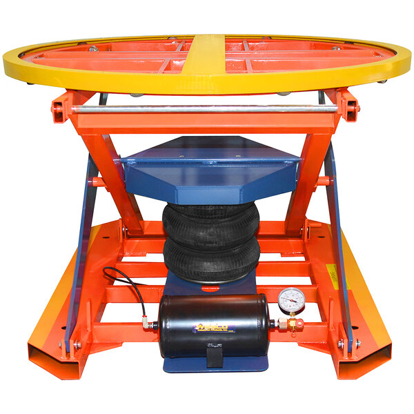 A Wesco pneumatic pallet leveler machine with tires and a large orange wheel.