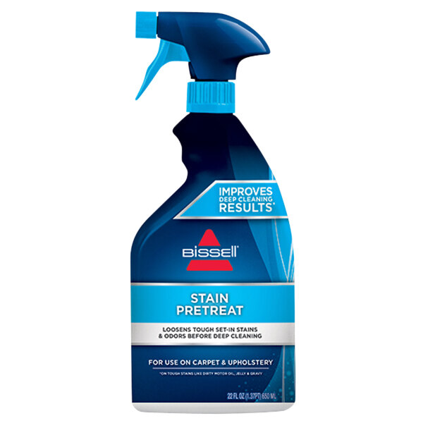 A blue Bissell spray bottle of stain remover with a blue and red label.