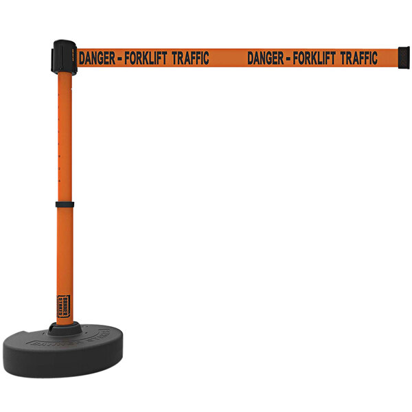 A Banner Stakes orange and black retractable barrier with a "Danger-Forklift Traffic" sign.