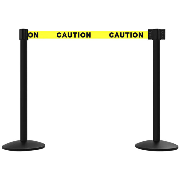 A black pole with yellow "Caution" tape on a Banner Stakes base.