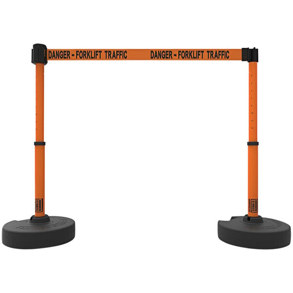 Two orange and black Banner Stakes retractable barriers with "Danger-Forklift Traffic" tape.