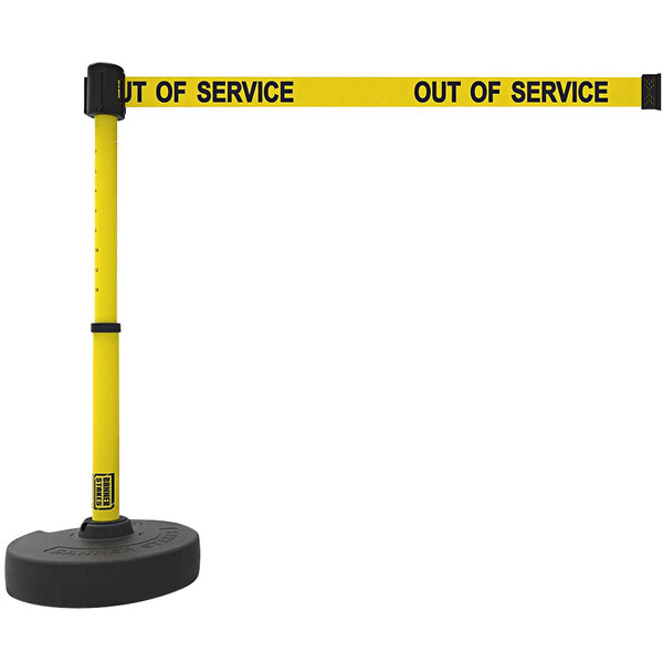 A yellow Banner Stakes PLUS retractable barrier with black text reading "Out of Service" on a black pole.