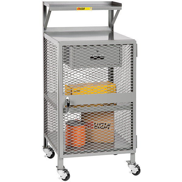 A grey metal Little Giant shop desk cart with drawers and shelves.