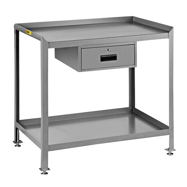 A grey steel Little Giant workstation table with 2 shelves and a drawer.