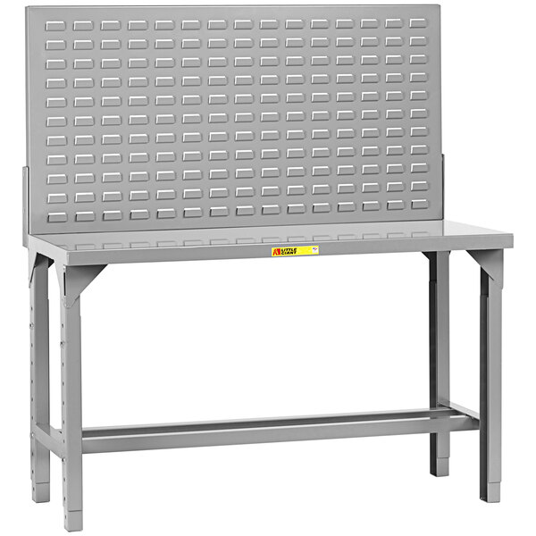 A grey metal Little Giant work bench with a metal grid on the back.
