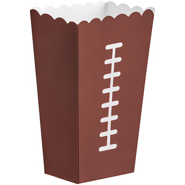 A brown paper snack box with a football design and white lettering.