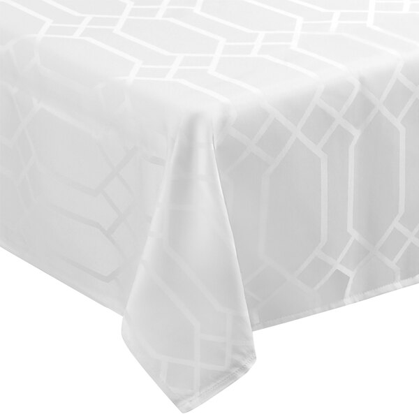 A white rectangular tablecloth with a gate pattern.