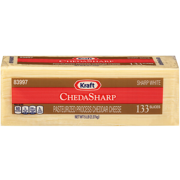 A package of Kraft sliced white sharp cheddar cheese on a counter.