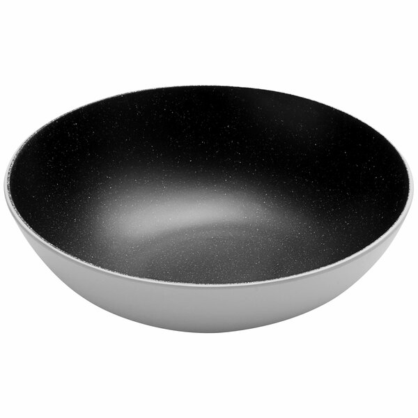 An American Metalcraft black and white slanted melamine bowl.