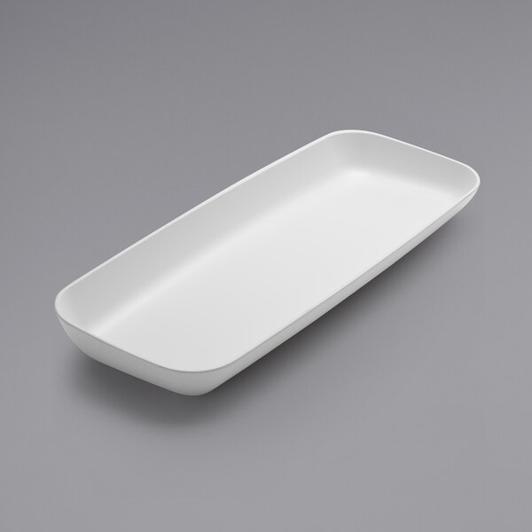 An American Metalcraft white rectangular melamine tray with a slanted end.