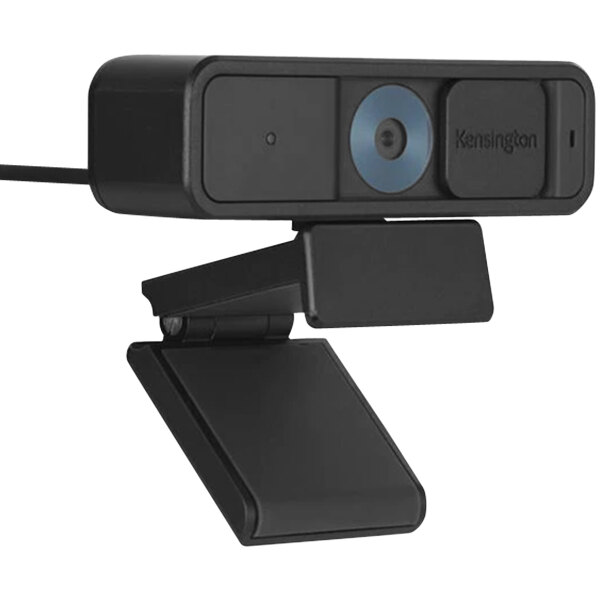 A black Kensington W2000 webcam with a blue circle on the front.