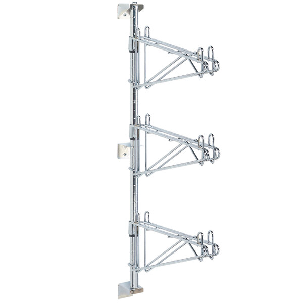 A Metro Super Erecta chrome wall mount rack with three levels.