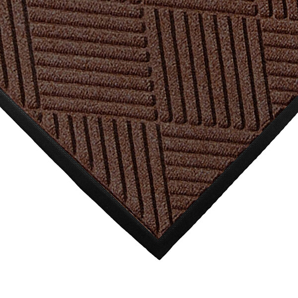 A dark brown WaterHog entrance mat with a diamond design and rubber border.